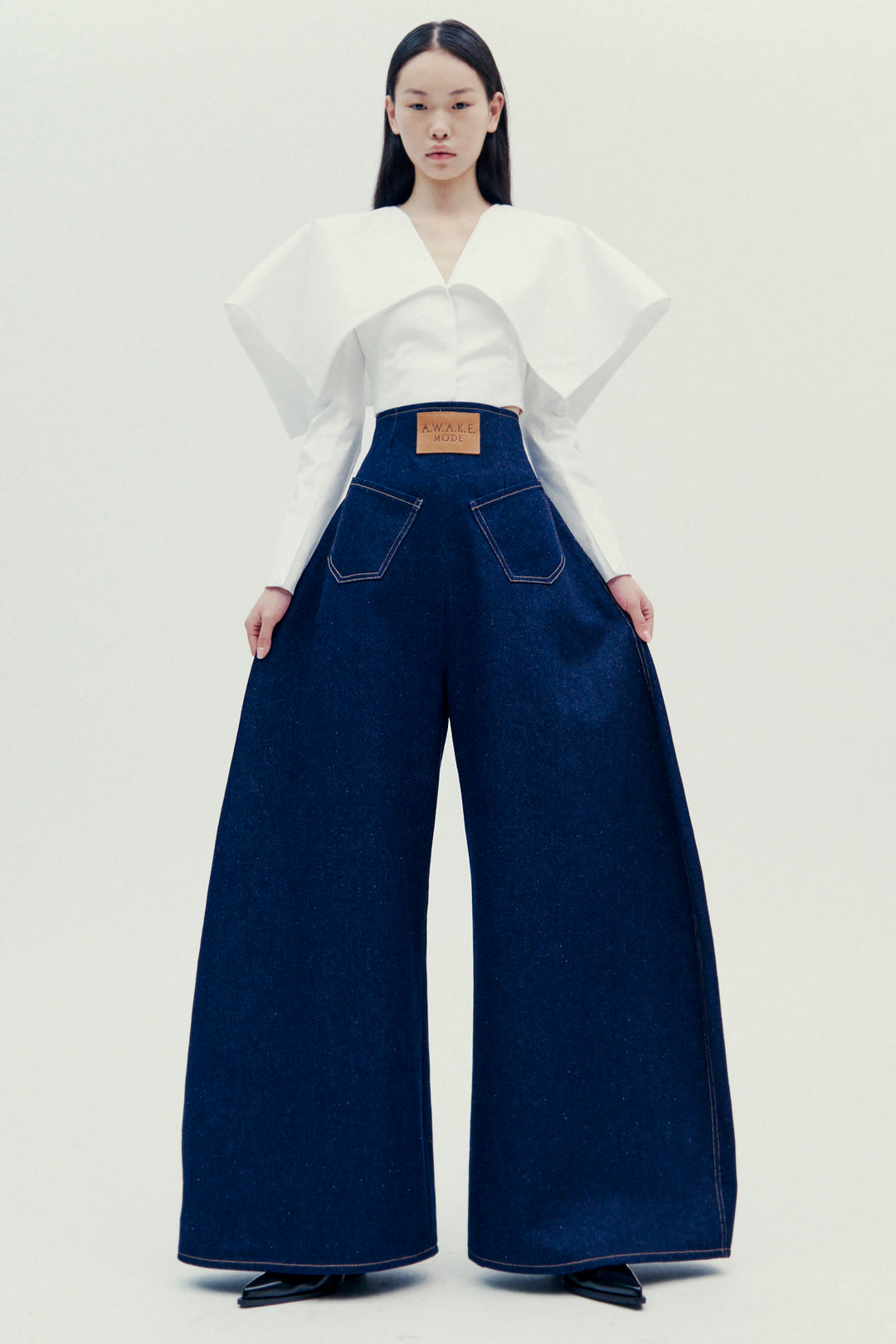 Rounded Back To Front Jeans Indigo Rinse Wash